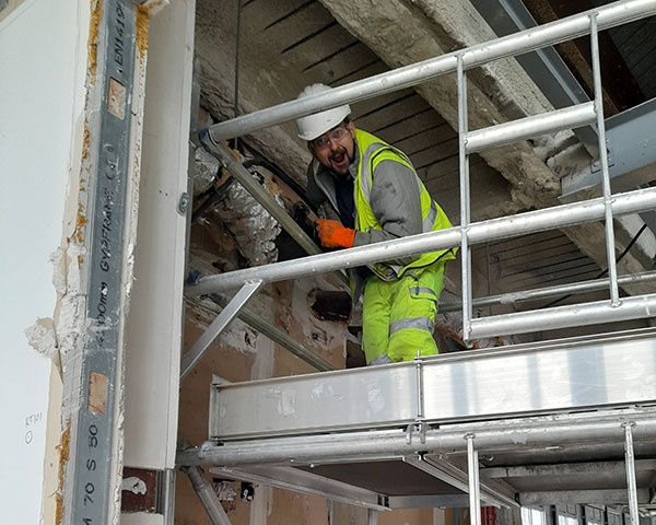 Inspecting a high level pipe.